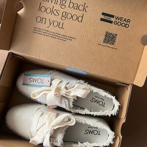 TOMS Off-White Frayed Canvas Slip-Ons